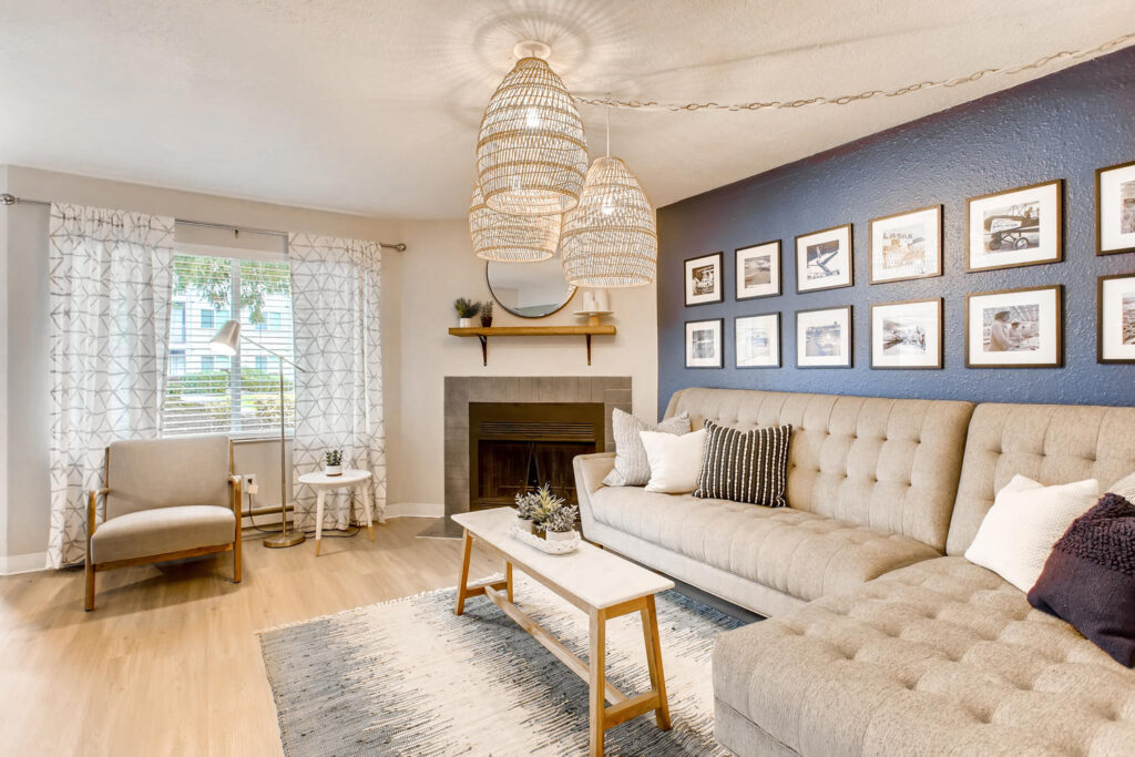 Living room with couch seating at Arterra Apartments for rent in Snohomish County.