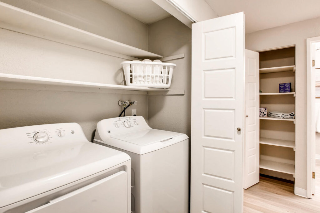Utility closet with washer and dryer