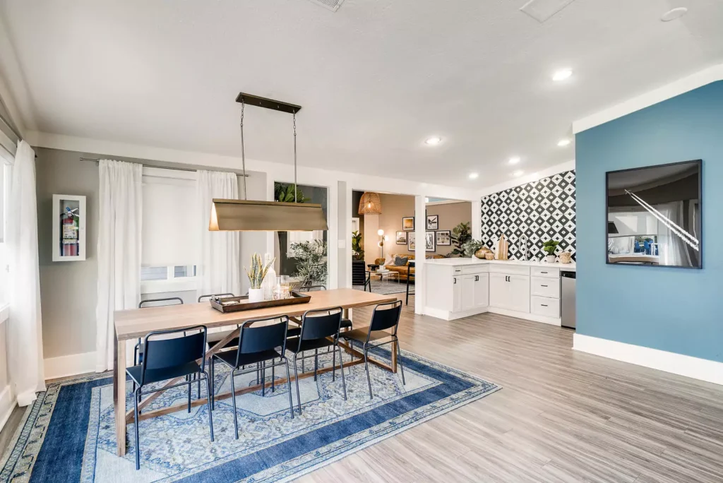 Clubhouse interior with kitchenette and lounge seating