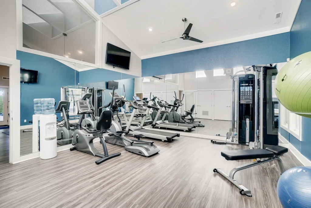 Fitness center with cardio and strength training equipment