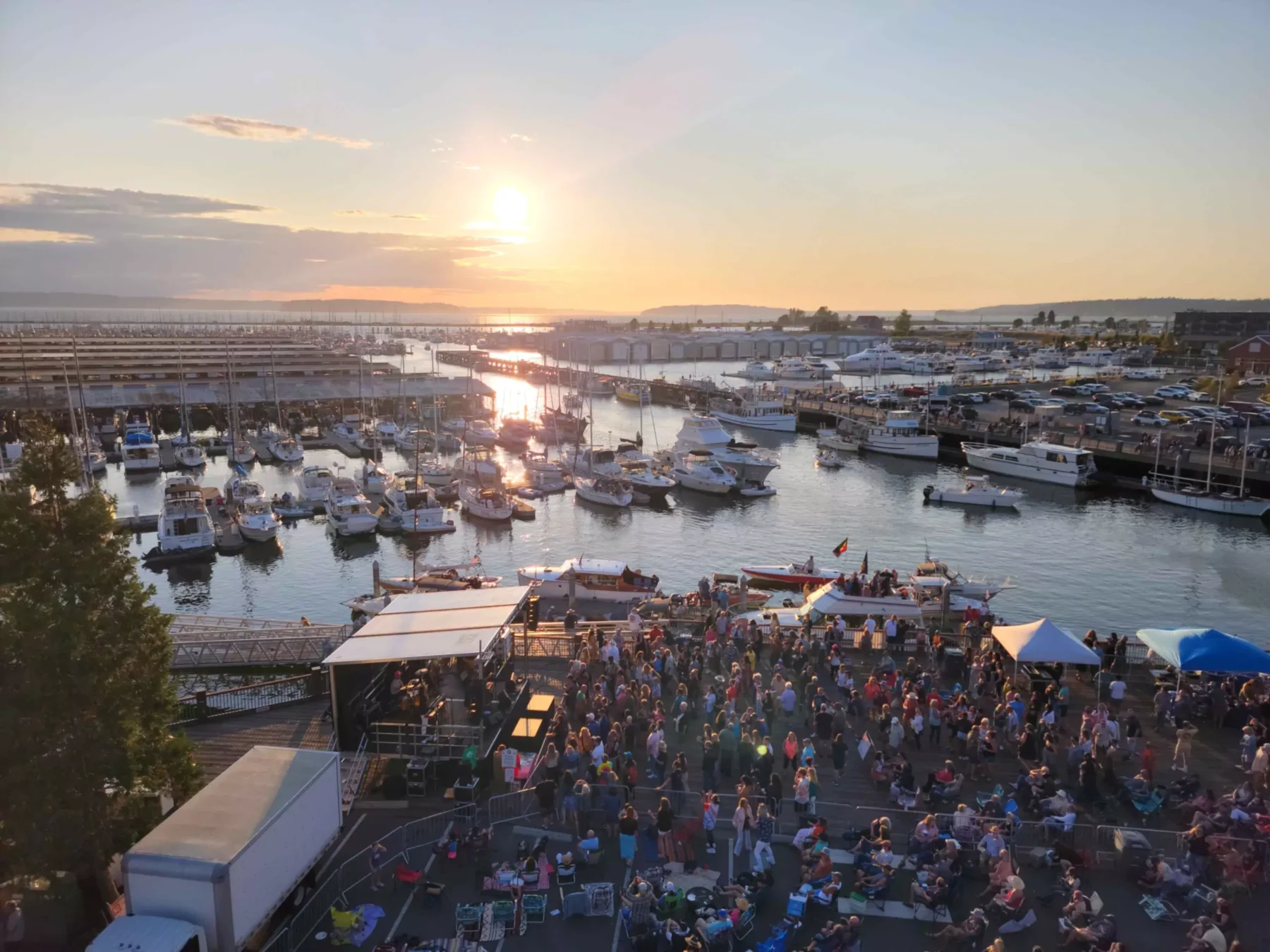 a crowded marina with live music