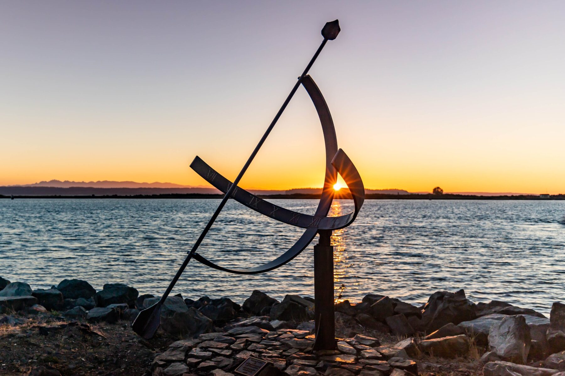 abstract sculpture on the edge of the water
